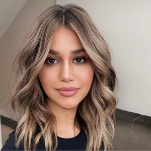 Beautiful 16” unit body wave mixed blonde free parted